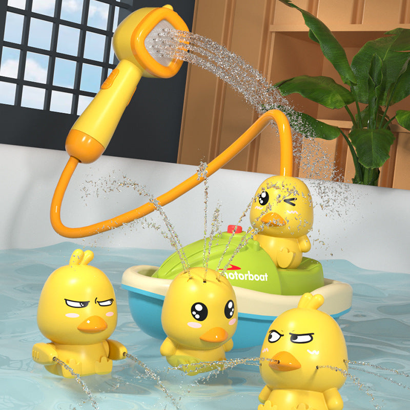 Baby bath toy set with water spray ducks and boat, featuring interactive design and shower function for fun bath time play.