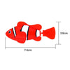 Red Swimming Robot Fish Toy with dimensions 7.6cm by 3.6cm, resembling a clownfish for kids' bath time and aquarium fun.