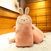 Plush rabbit pillow with cute facial expression on a bed, showcasing its soft, huggable design for comfort and decoration.