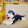 Husky plush toy on sofa, soft stuffed animal doll with realistic design, perfect for cuddling and gifting.