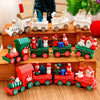 Mini wooden Christmas train set with festive designs and vibrant colors, perfect for holiday décor and gifting.