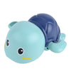 Cute blue plastic turtle bath toy with smiling face, perfect for kids' water play and bathtub fun.