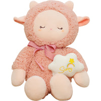 Plush pink sheep toy with embroidered face, soft wool fabric, and pink ribbon. Perfect for cuddles and decor.