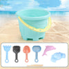 Kids Beach Toy Set with bucket and colorful sand tools on a sunny beach background.