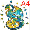 Colorful wooden dragon-shaped puzzle pieces on an A4 board.