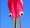 3D Octopus Kite flying against a clear blue sky, showcasing vibrant colors and long rainbow tails for outdoor fun.