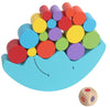 Colorful wooden moon balance toy with stacking pieces and a dice, designed for kids to develop motor skills and hand-eye coordination.