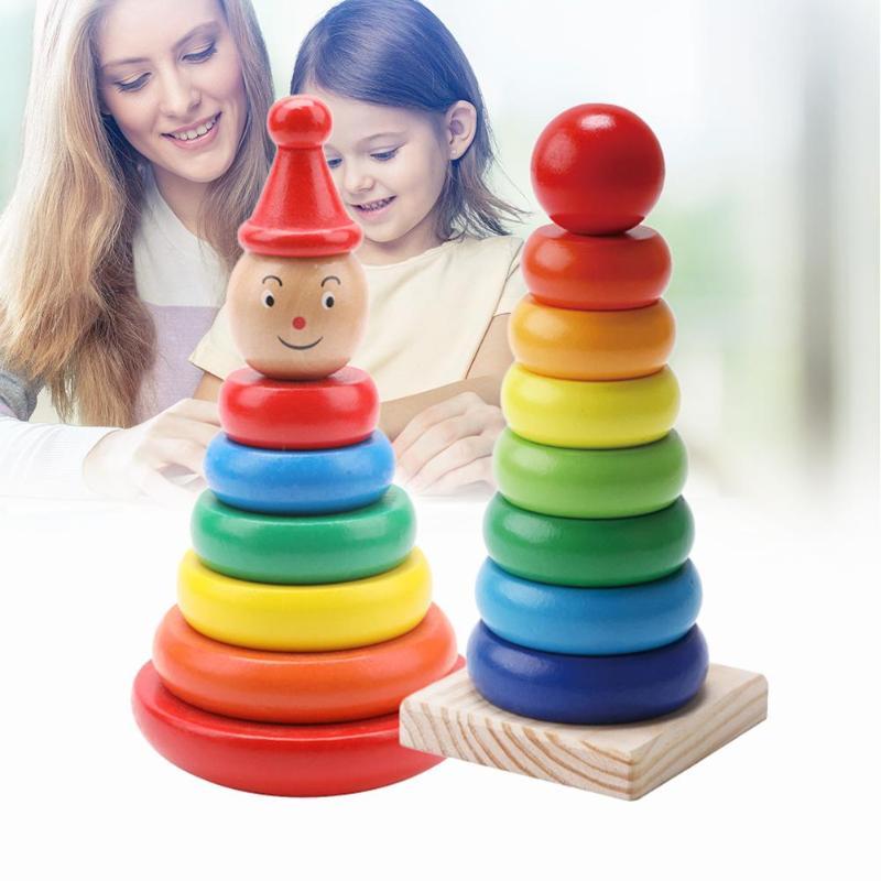 Wooden rainbow stacking toy for children, featuring colorful rings and a smiling face, ideal for enhancing early learning development.