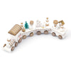 Mini wooden Christmas train set with snowmen and gifts, featuring festive white and brown design, perfect for holiday décor.