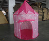 Pink foldable kids play tent with star and heart patterns for indoor and outdoor adventures.