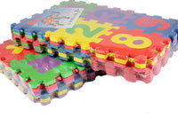 Colorful foam alphabet and number puzzle mat pieces stacked together for educational play.