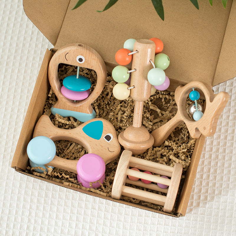 Wooden Baby Rattle Drum Set in gift box, featuring colorful beech wood toys for newborns and toddlers. Eco-friendly and perfect for sensory play.