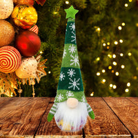 Festive fabric gnome doll with star hat and candy jar base, perfect for holiday desktop décor and celebrations.