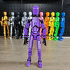 Purple Movable Shapeshift Robot 2.0 with colorful robot lineup in background on wooden surface.