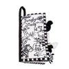 Black and white baby cloth book with animal illustrations and tactile tails for sensory learning.