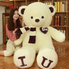 Giant heart bear plush pillow with "I Love You" on paws, perfect soft teddy bear gift for Valentine's Day and special occasions.