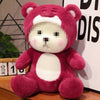 Cute pink teddy bear plush doll with a soft ragdoll body, perfect for Valentine's Day gift, sitting on a table with decor in the background.