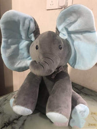 Peek-A-Boo Elephant Plush Toy with big ears, perfect for singing and interactive hide-and-seek play for babies and toddlers.