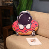 Plush Astronaut Rocket Pillow in donut shape on sofa, perfect for kids and space lovers, made with soft plush fabric and PP cotton filling.