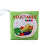 Soft cloth baby book cover with colorful vegetable illustrations promoting tactile and auditory learning for infants.