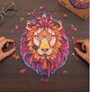 Person assembling a colorful lion-shaped wooden puzzle with intricate designs, perfect for DIY craft enthusiasts and gift ideas.