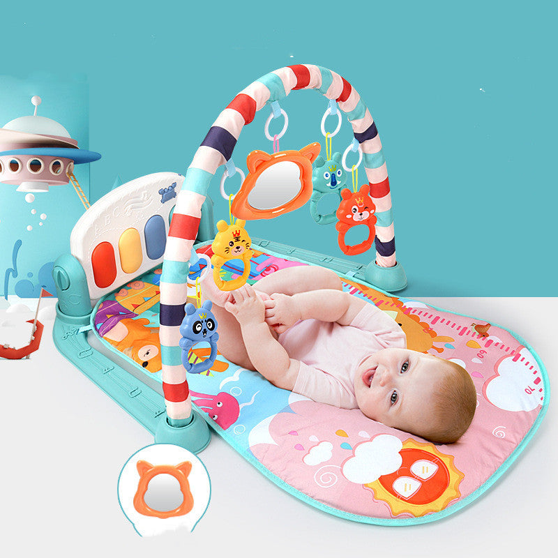 Baby enjoying playtime on colorful play gym with interactive piano keys and hanging toys. Perfect for sensory and motor development.