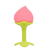 Pink and green silicone baby teether shaped like a fruit with textured surface for gum relief.