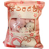 Snack Bag Plush Pillow filled with mini plush snacks in a pink floral bag featuring Japanese characters and rabbit design.