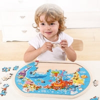 Child playing with a colorful wooden world map puzzle, enhancing geography skills and creativity.