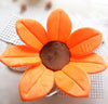 Sunflower Baby Bath Mat with soft, plush orange petals for cozy infant sink baths.