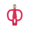 Silicone baby teether in pink monkey design for teething relief and gum massage. Safe and soft chewable toy for infants.