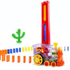 Electric Domino Train Toy laying colorful dominoes with cactus accessory in background for kids' creative play and problem-solving fun.