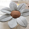 Sunflower Baby Bath Mat with soft gray petals and brown center for comfortable infant sink bathing.