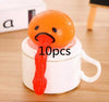 Funny vomiting egg yolk toy on mug for stress relief and prank fun, pack of 10.