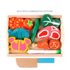 Wooden fruit and vegetable cutting toy set with multiple pieces in a wooden box for imaginative play and skill development.