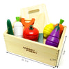 Wooden fruit and vegetable cutting toy set in a box, featuring colorful pretend play foods to enhance fine motor skills and creativity.