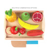 Wooden fruit and vegetable cutting toy set with banana, pineapple, apple, and more on a tray. Perfect for imaginative play and skill development.