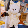 Cute bear plush doll wearing a dress with a bow, perfect for children and collectors.