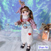 12-inch fashion doll in plaid outfit and heart overalls, posed on a fluffy surface with decorative background.