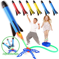 Kids playing with air rocket launcher toy, colorful foam rockets, fun outdoor game, STEM activity, foot pump launching action.