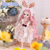 Articulated 1/6 BJD doll in floral dress with pink hair standing in a garden-themed setting, perfect for girls' dress-up play.