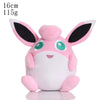 Wigglytuff plush toy, 16cm tall, weighing 115g, soft pink and white design with large green eyes and black ears, perfect for cuddling.