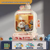 Space-themed claw machine toy with plush toys, interactive joysticks, and buttons in a modern design for kids' fun and parties.