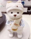 Little Bear Plush Doll wearing a hat, scarf, and overalls, showcasing its kawaii design and changeable clothes for creative play.