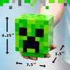 Minecraft Creeper LED night light held in hand, showing dimensions 4.25” x 3.5” x 3.5”. Perfect for kids' bedside or game room decor.