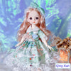 Fashion doll with green dress and lace trim, set against a colorful backdrop.