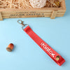 Colorful Roblox-themed keychain lanyard with creative cartoon prints, featuring a durable red strap and metal clip, on light background.