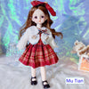 12-inch fashion doll in red plaid dress and white jacket with bow, standing in a colorful setting.