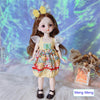 Fashion doll with butterfly dress and bow in hair, standing on a soft white surface with colorful background.