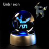 LED night light with 3D etched Umbreon inside crystal ball, featuring multicolor lighting base. Perfect for Pokemon fans.